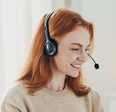 dark haired man on the phone