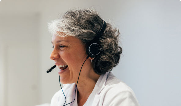 Female receptionist with white hair