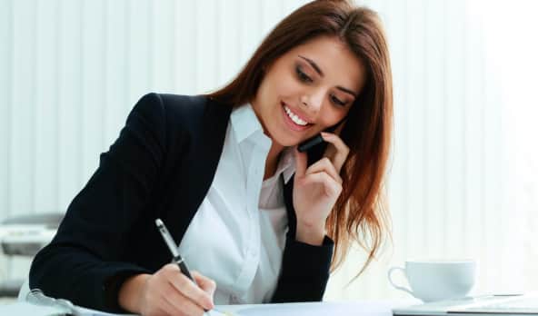 Women writing on paper