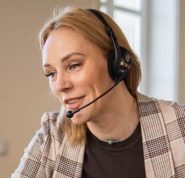 Female virtual receptionist taking calls