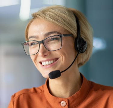 Portrait of a women smiling while taking on the phone