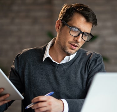 Man looking at laptop
