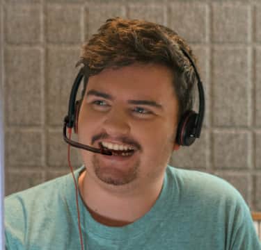 Receptionist answering call over headphone