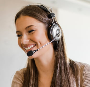Answering service receptionist with a headset