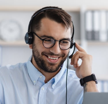 Answering service receptionist with a headset